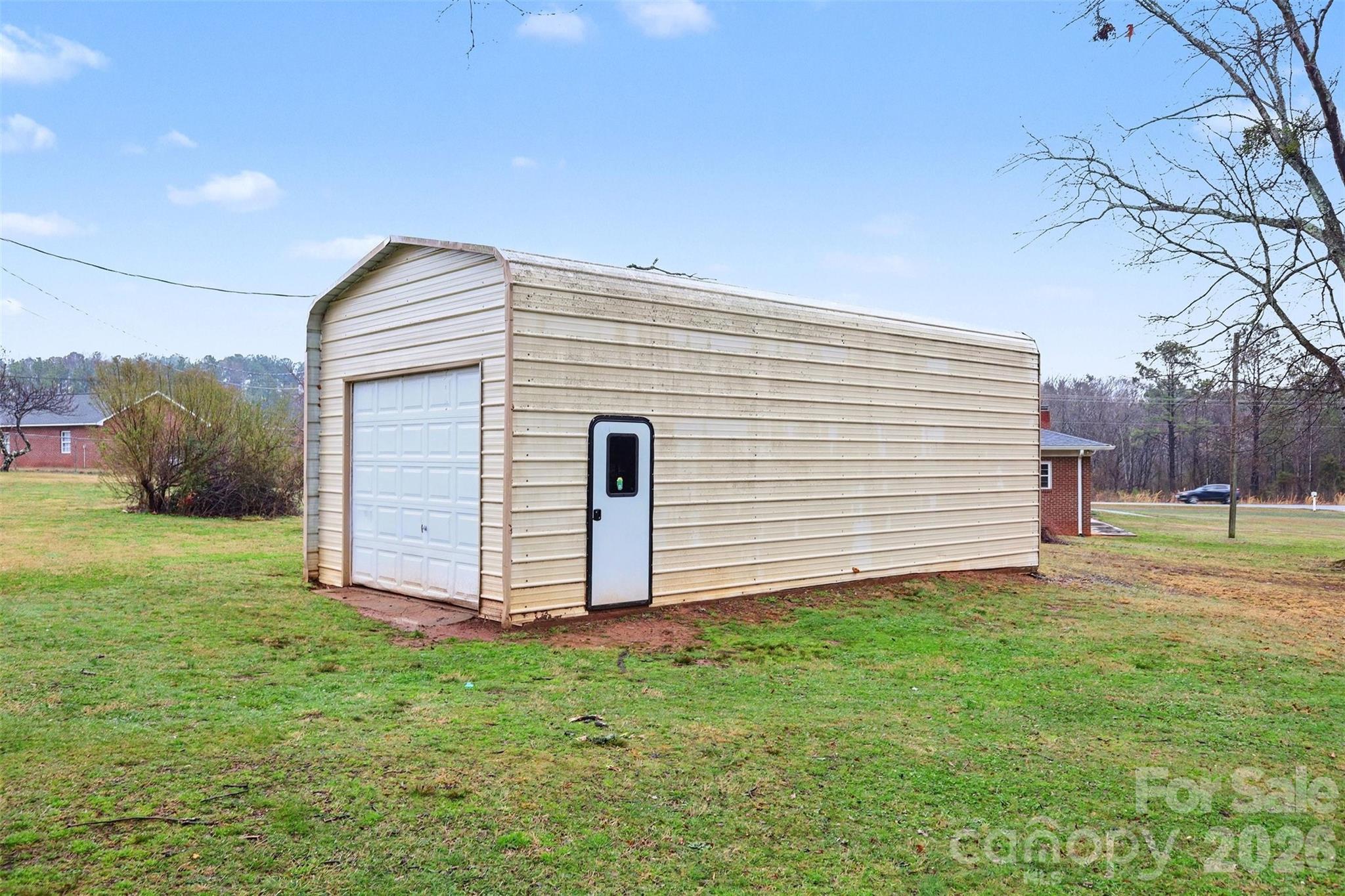 1008 Edgewood Road Bessemer City, NC 28016 - Photo 20 of 26 a view of a house with backyard