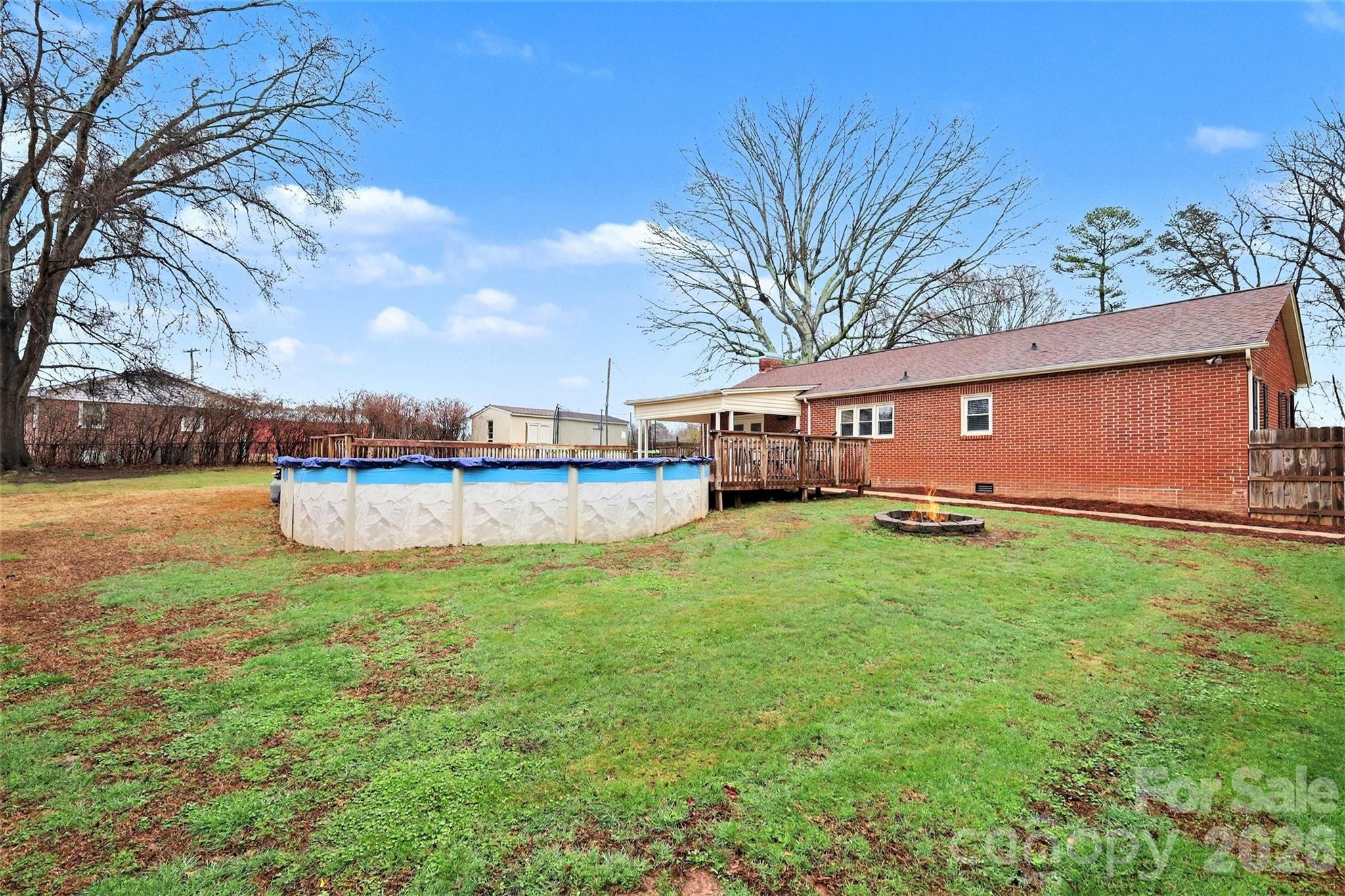 1008 Edgewood Road Bessemer City, NC 28016 - Photo 22 of 26 a view of a house with a yard