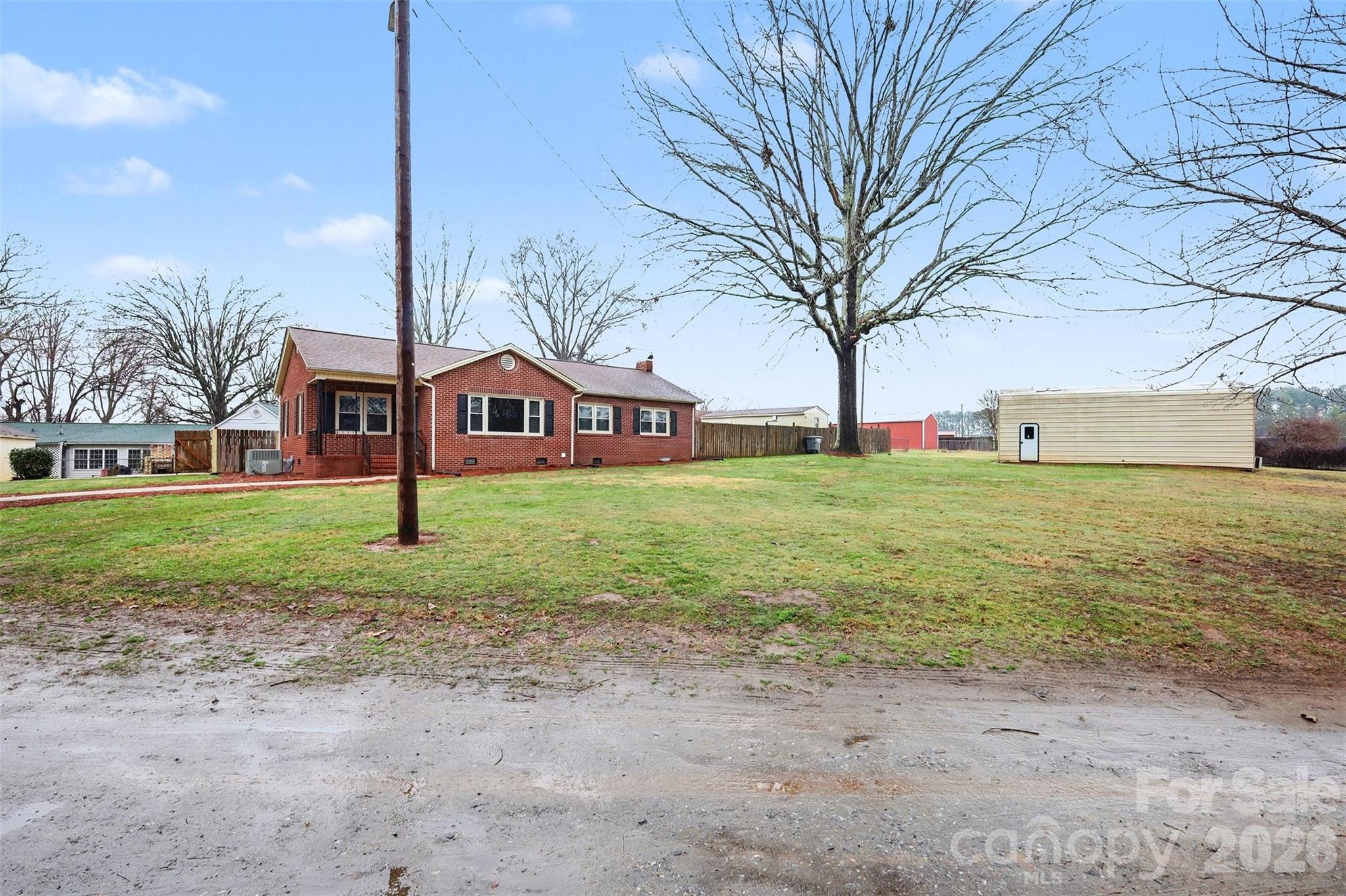1008 Edgewood Road Bessemer City, NC 28016 - Photo 4 of 26 a house with garden view