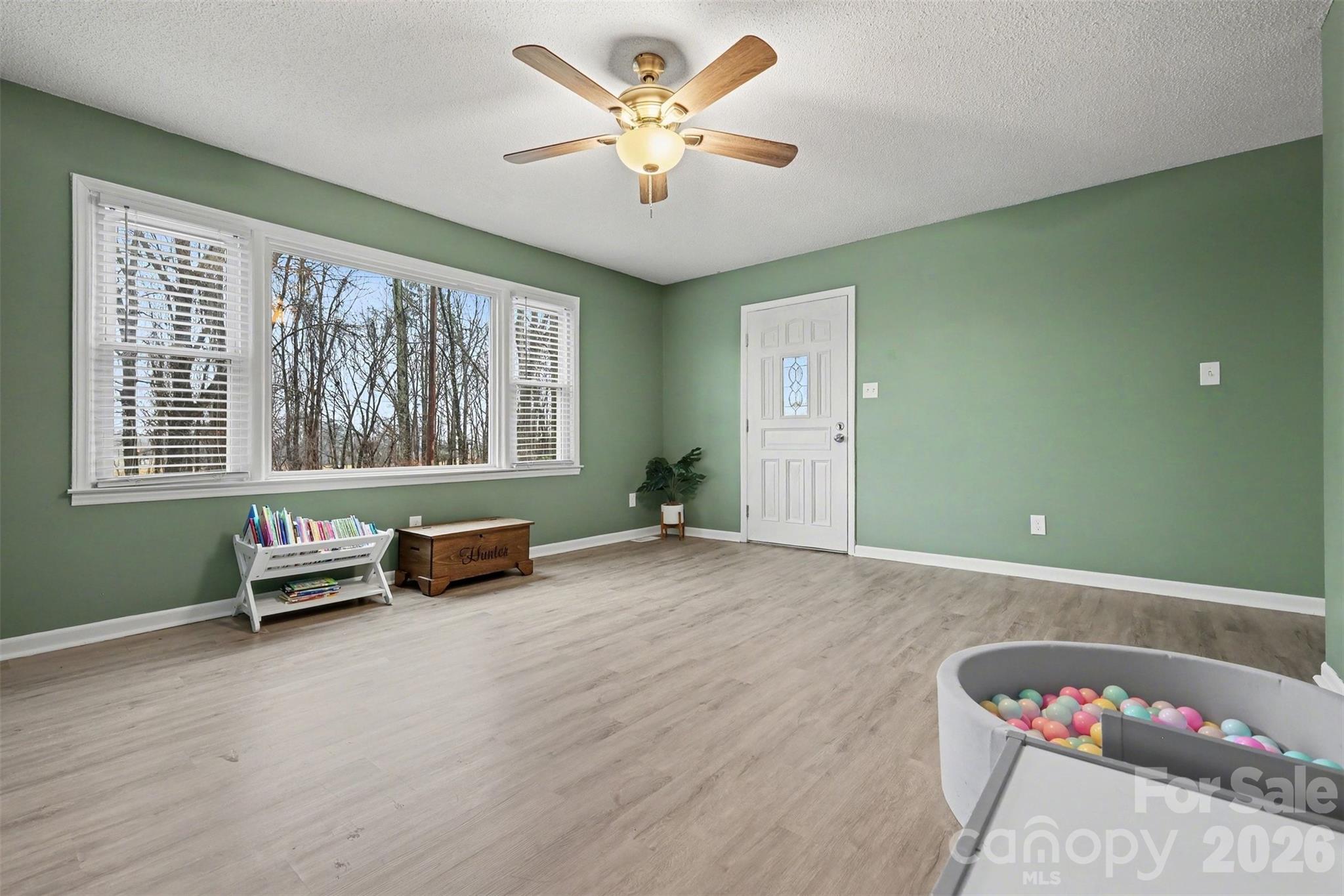 1008 Edgewood Road Bessemer City, NC 28016 - Photo 7 of 26 a living room with furniture and a large window