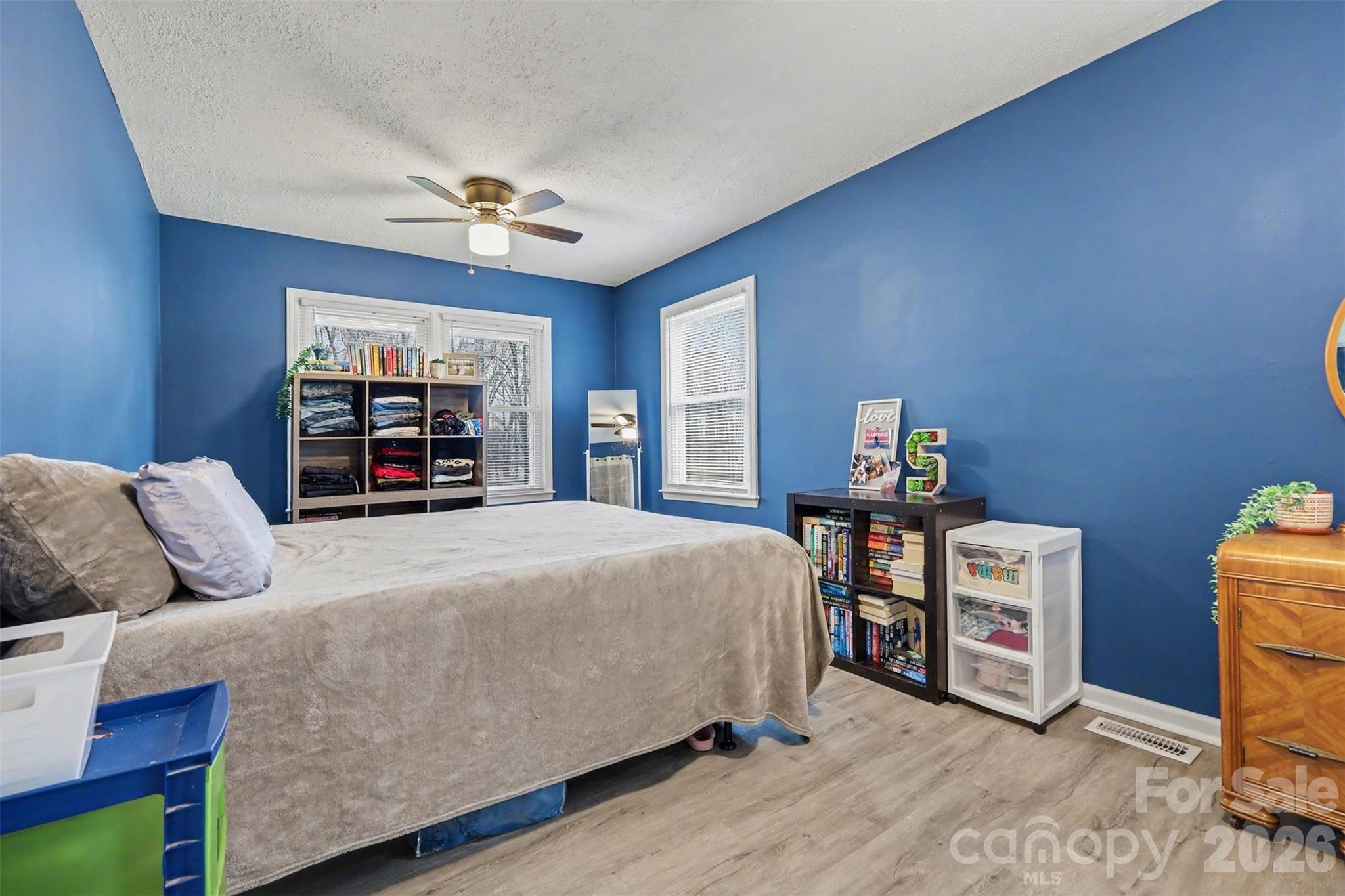 1008 Edgewood Road Bessemer City, NC 28016 - Photo 8 of 26 a bed room with a bed and a tv