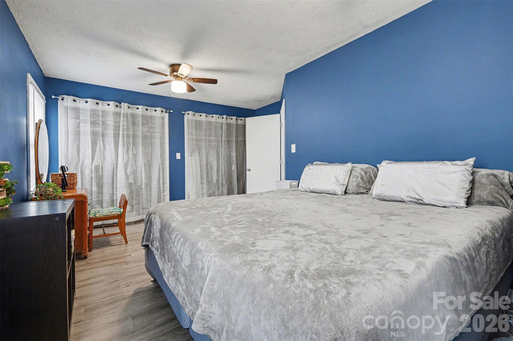 1008 Edgewood Road Bessemer City, NC 28016 - Photo 9 of 26 a large bed sitting in a bedroom next to a window
