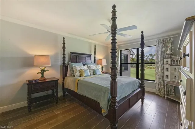 a bed room with a bed and a night stand