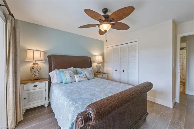 a bed room with a bed and a chandelier