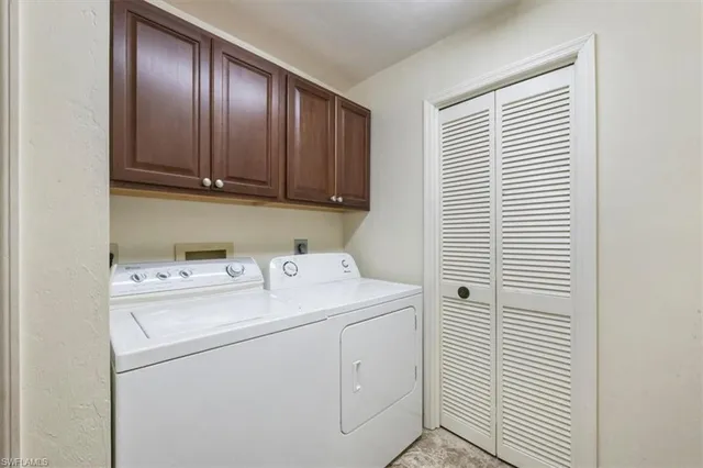 a view of a storage room with washer and dryer