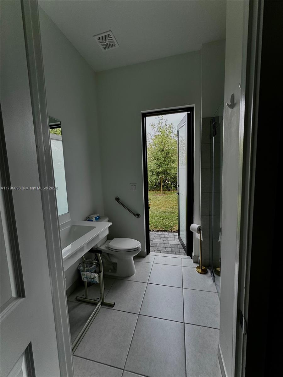 4409 Southwest 173rd Avenue Miramar, FL 33029 - Photo 16 of 38 a room with furniture and a window