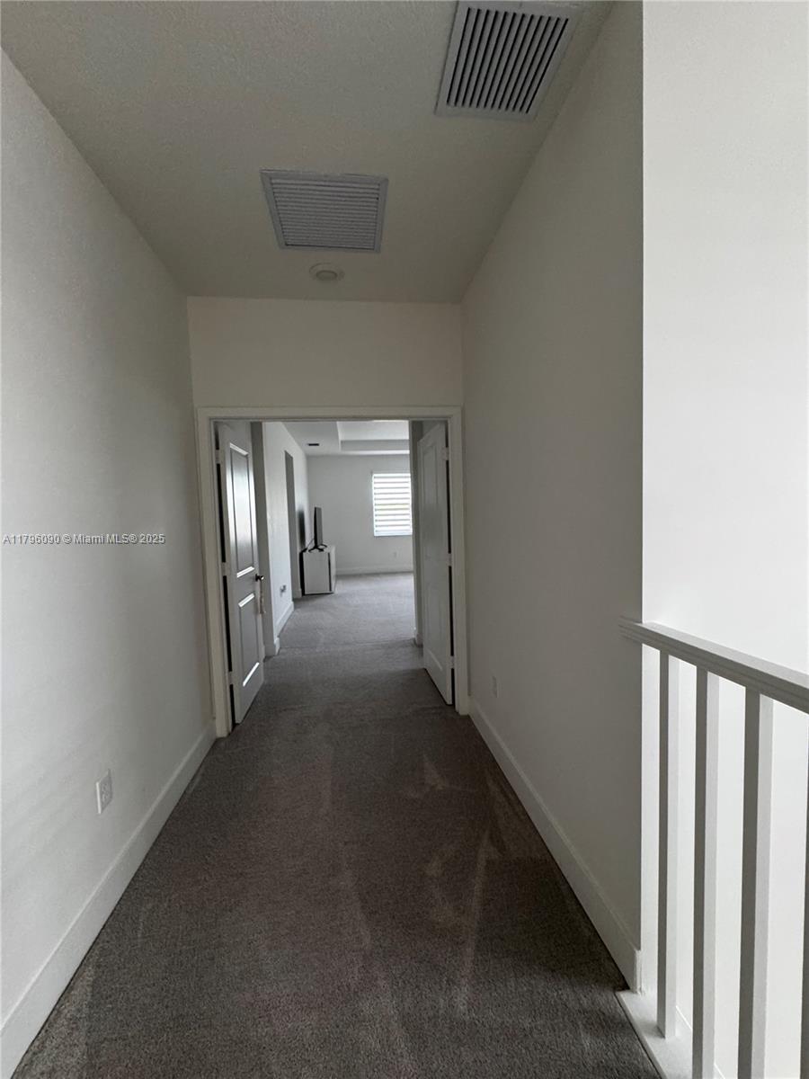 4409 Southwest 173rd Avenue Miramar, FL 33029 - Photo 31 of 38 a view of hallway with livingroom