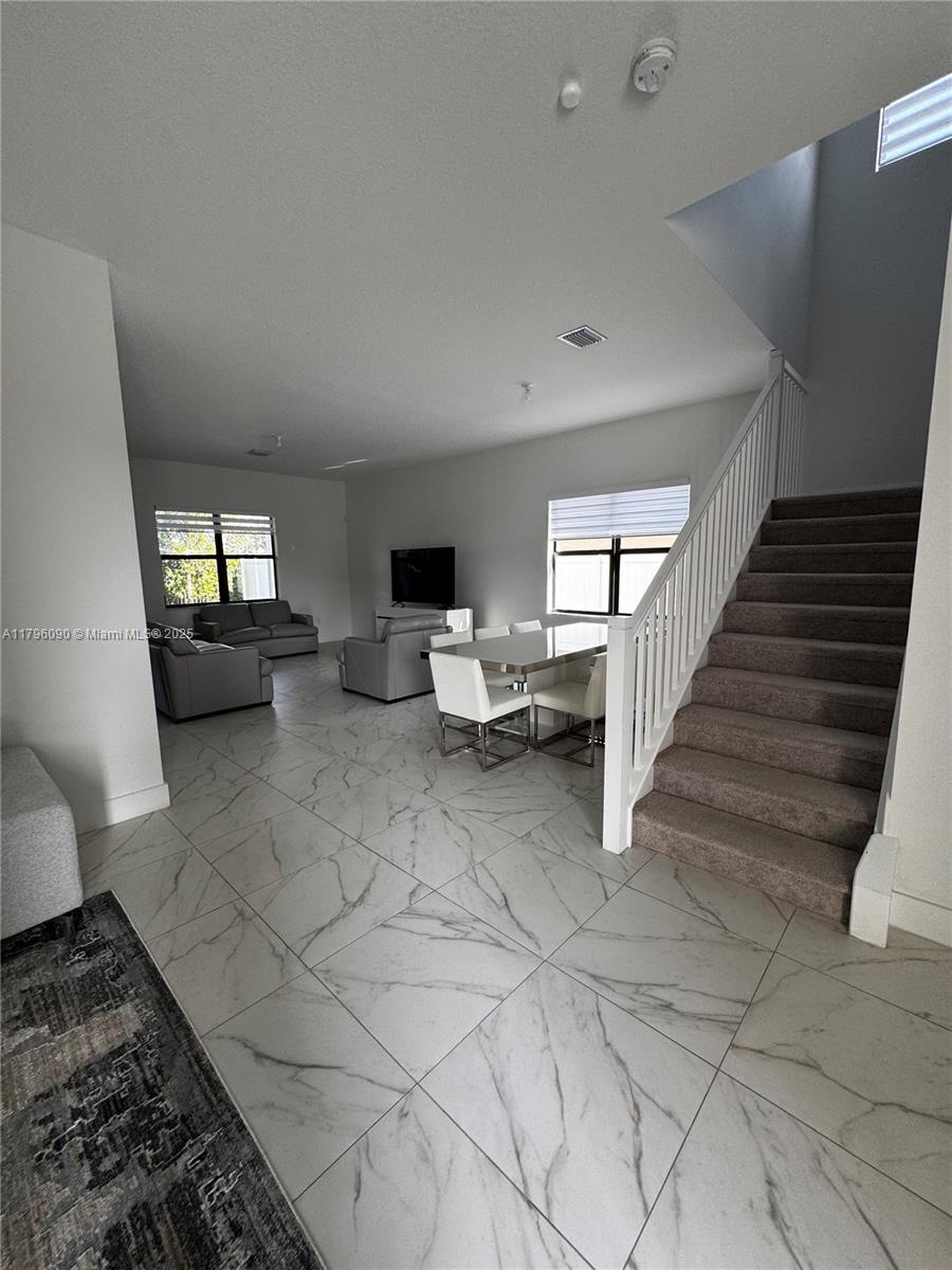 4409 Southwest 173rd Avenue Miramar, FL 33029 - Photo 4 of 38 a view of entryway and hall