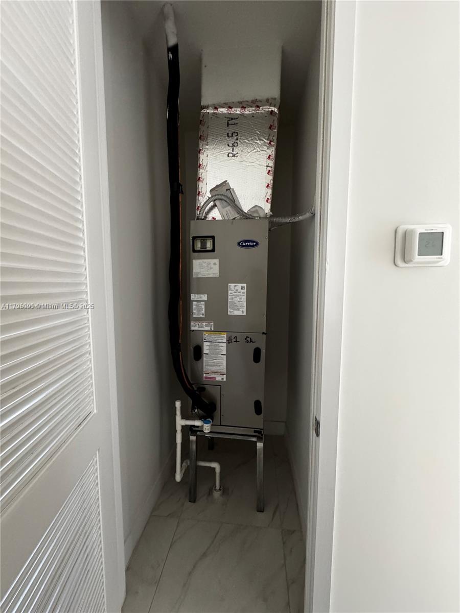 4409 Southwest 173rd Avenue Miramar, FL 33029 - Photo 7 of 38 an empty room with windows