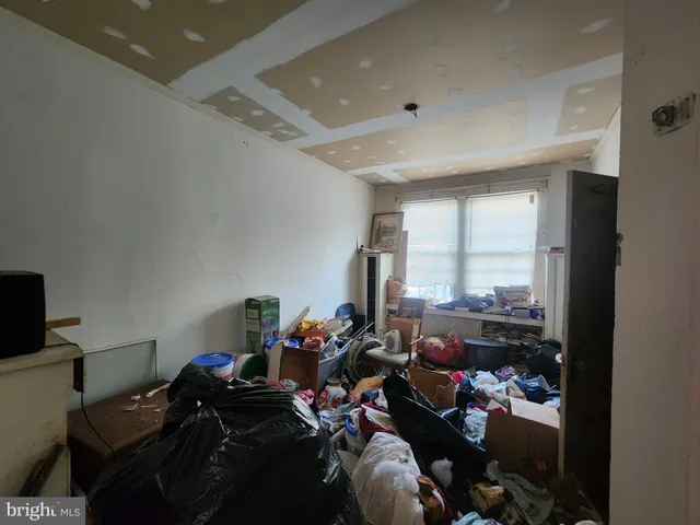 a room with furniture and a window