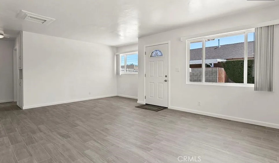 45122 Date Lancaster, CA 93534 - Photo 8 of 9 a view of an empty room with a window