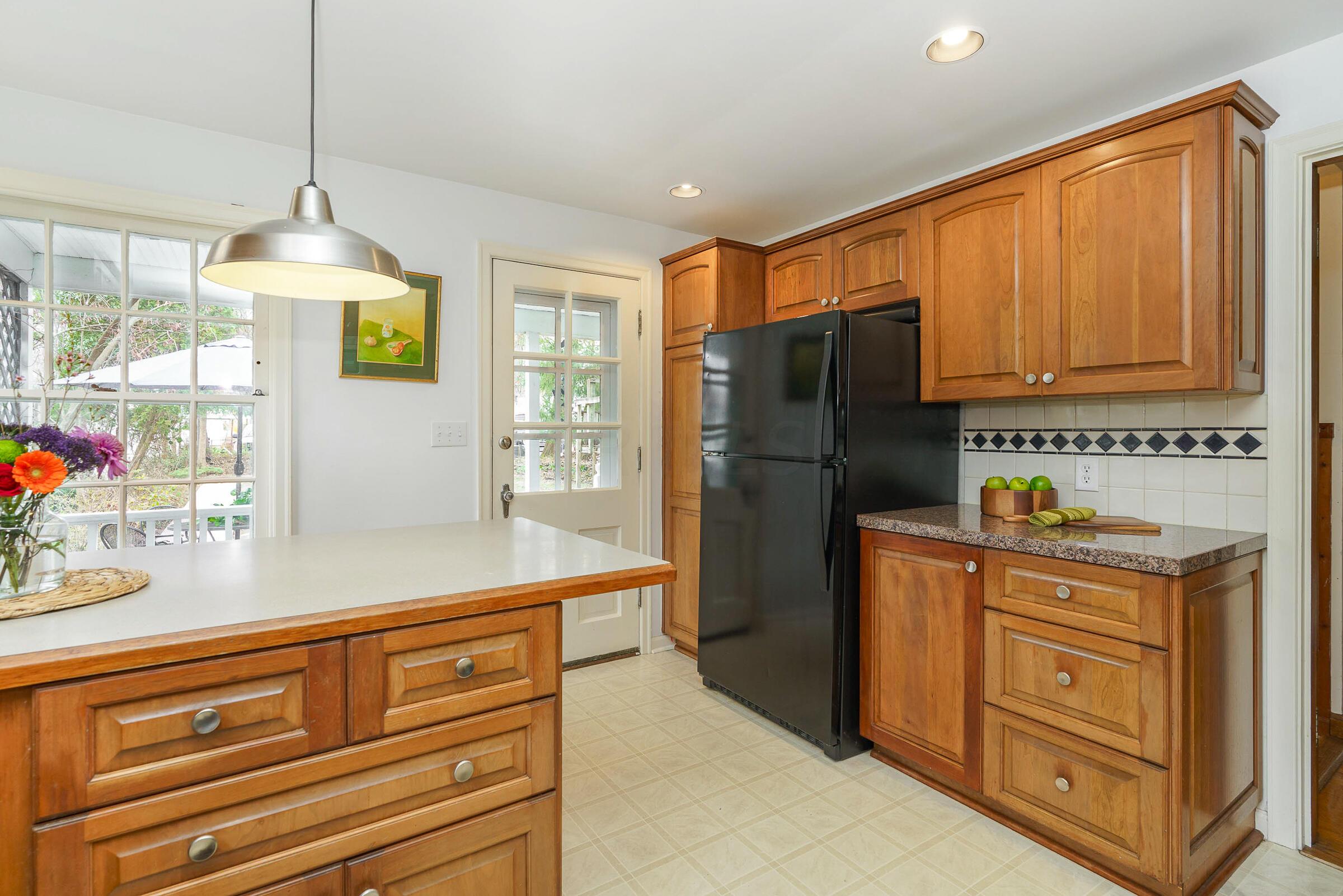 408 Midgard Road Columbus, OH 43202 - Photo 16 of 46 This kitchen features an abundance of cabinetry and storage space.