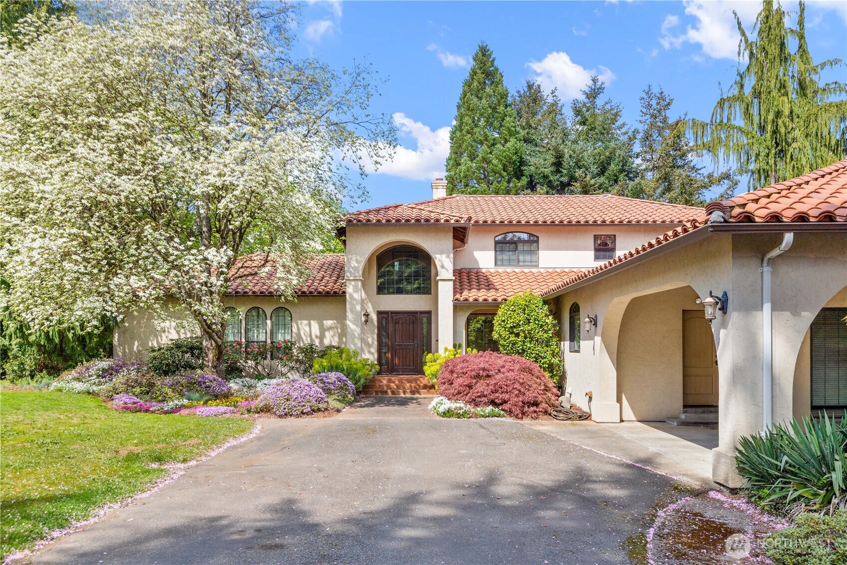 1788 Matz Road Ferndale, WA 98248 - Photo 2 of 40 a front view of a house with a garden