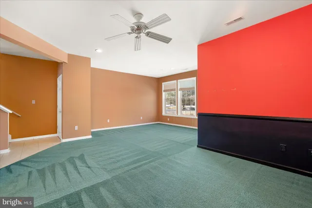 a view of a houses with wooden deck