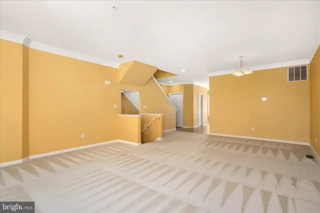 a view of a big room with wooden floor