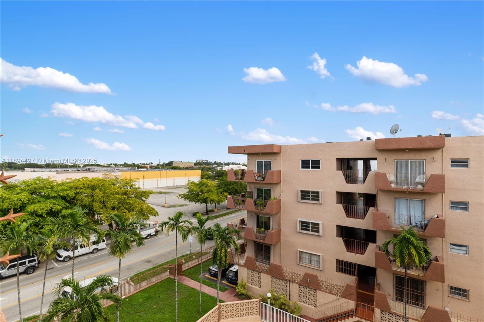 1630 West 46th Street, Unit 514B Hialeah, FL 33012 - Photo 20 of 26 a view of a lake with building in front of it