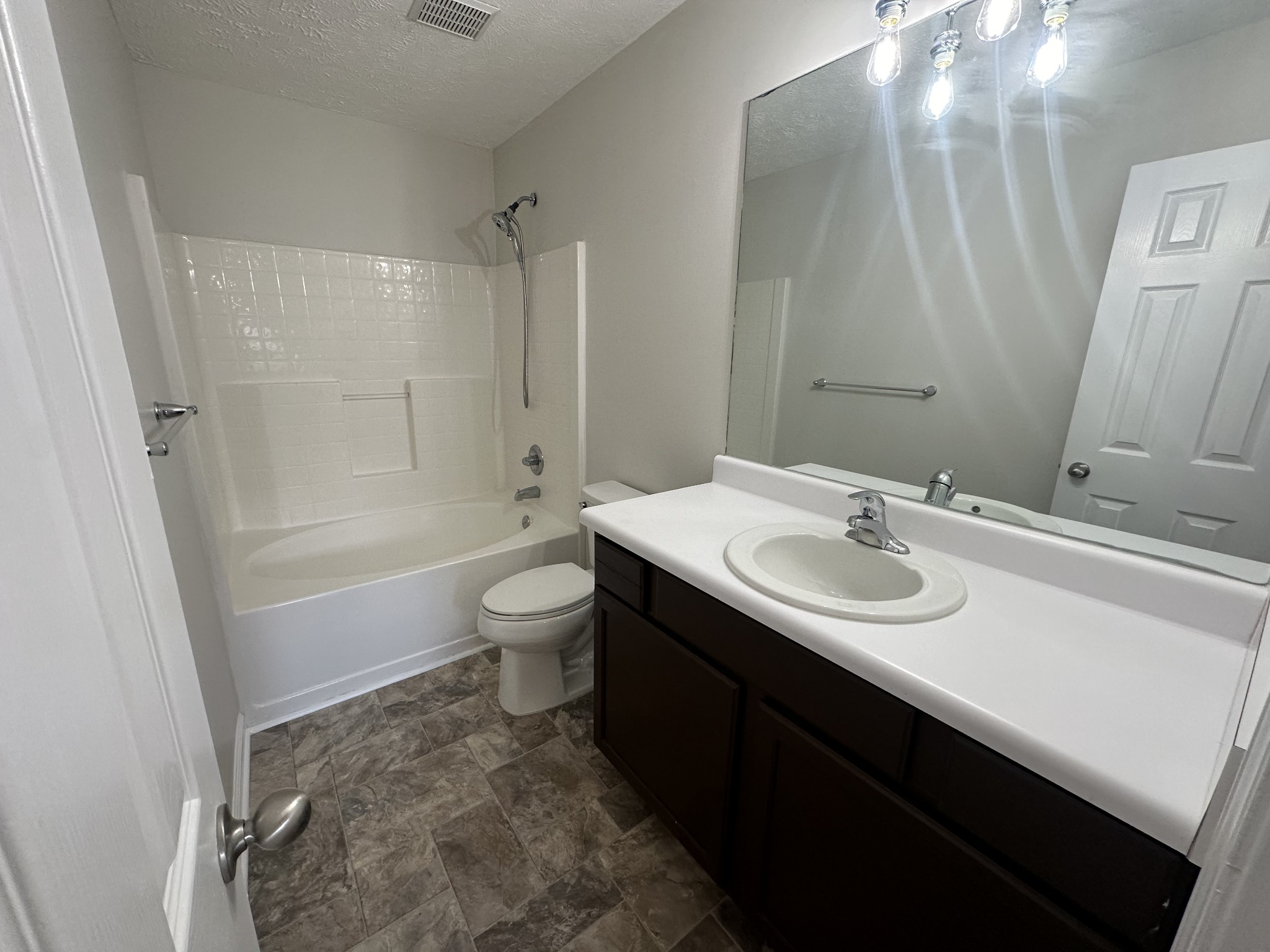 4859 Chelanie Circle Murfreesboro, TN 37129 - Photo 15 of 27 a bathroom with a sink a toilet and shower