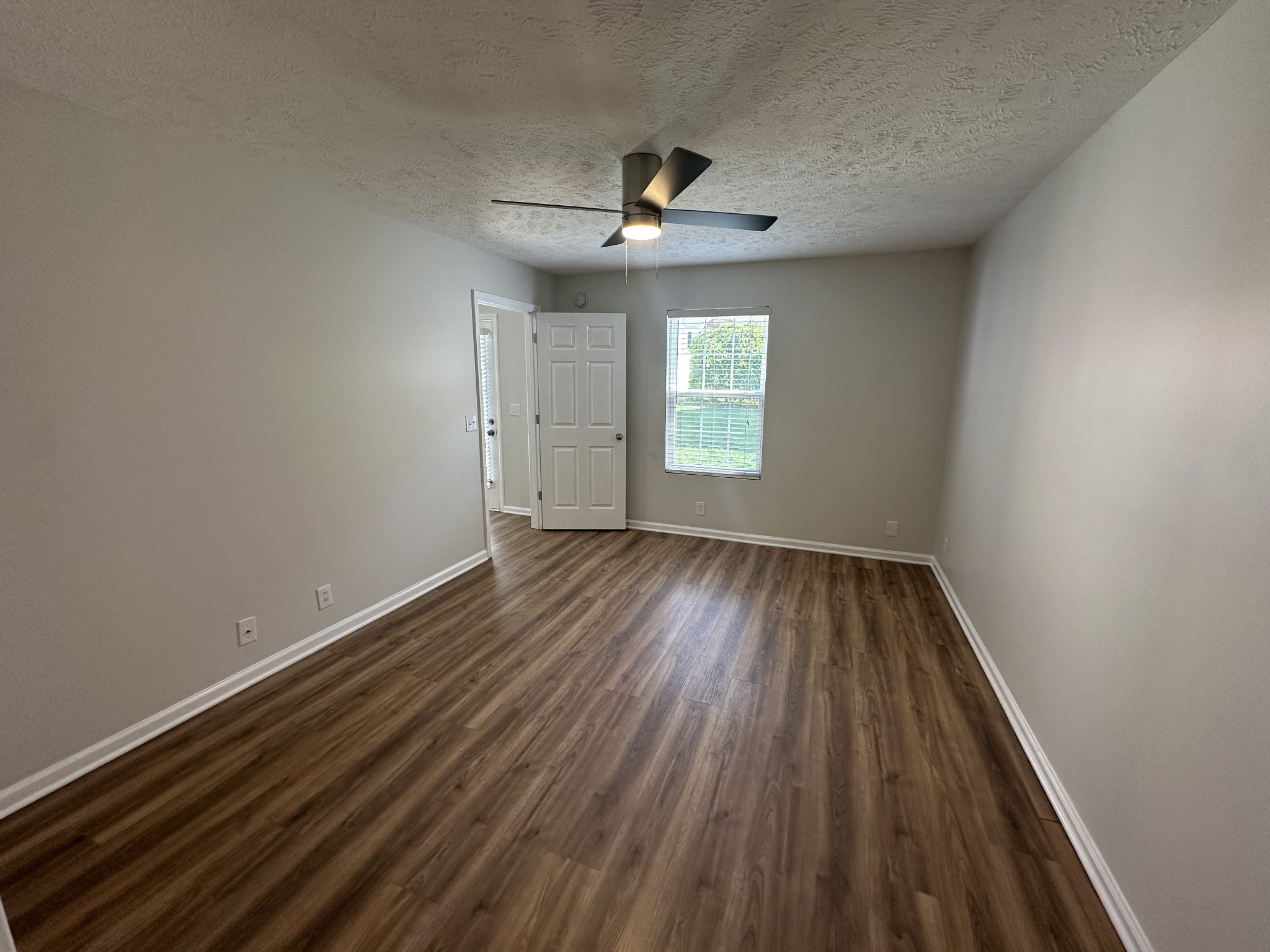 4859 Chelanie Circle Murfreesboro, TN 37129 - Photo 17 of 27 wooden floor in an empty room with a window