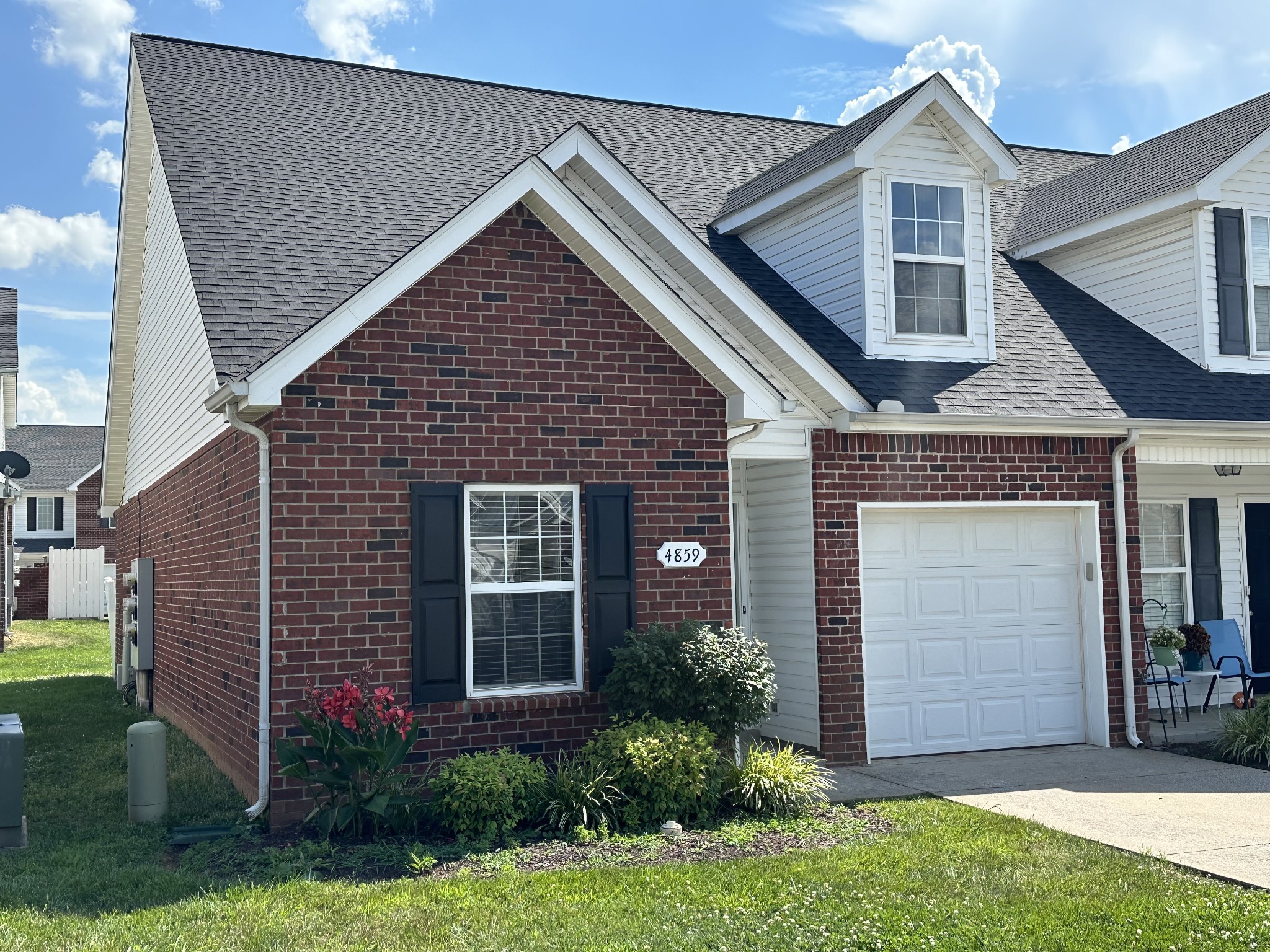 4859 Chelanie Circle Murfreesboro, TN 37129 - Photo 27 of 27 a front view of a house with a yard and garage