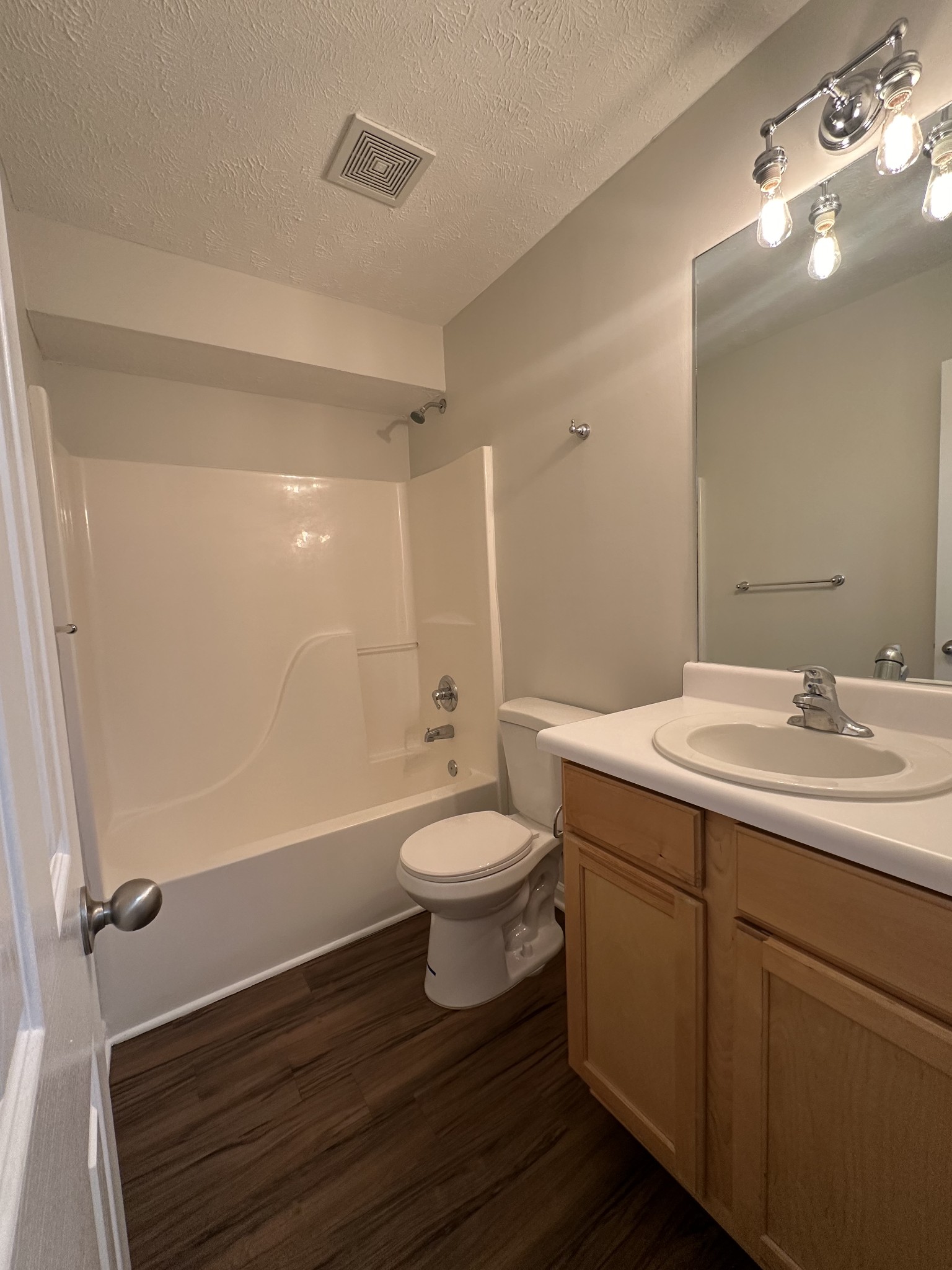 4859 Chelanie Circle Murfreesboro, TN 37129 - Photo 6 of 27 a bathroom with a sink a toilet and shower