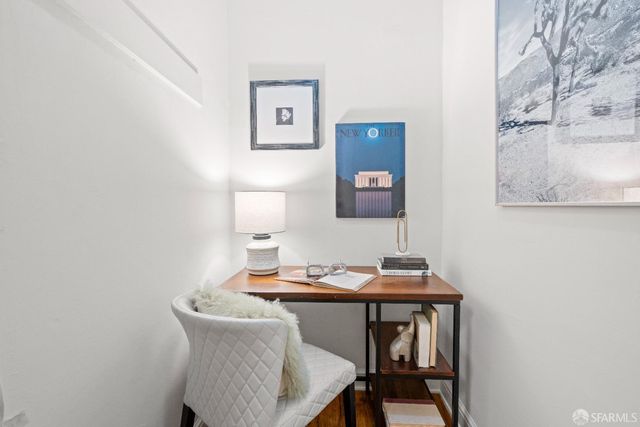 a view of a workspace with furniture