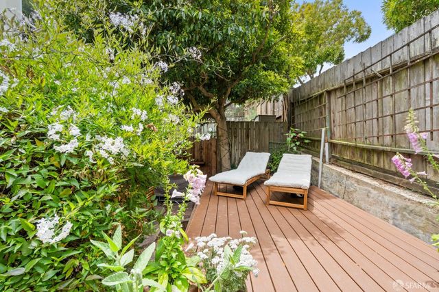 a view of a backyard with a patio