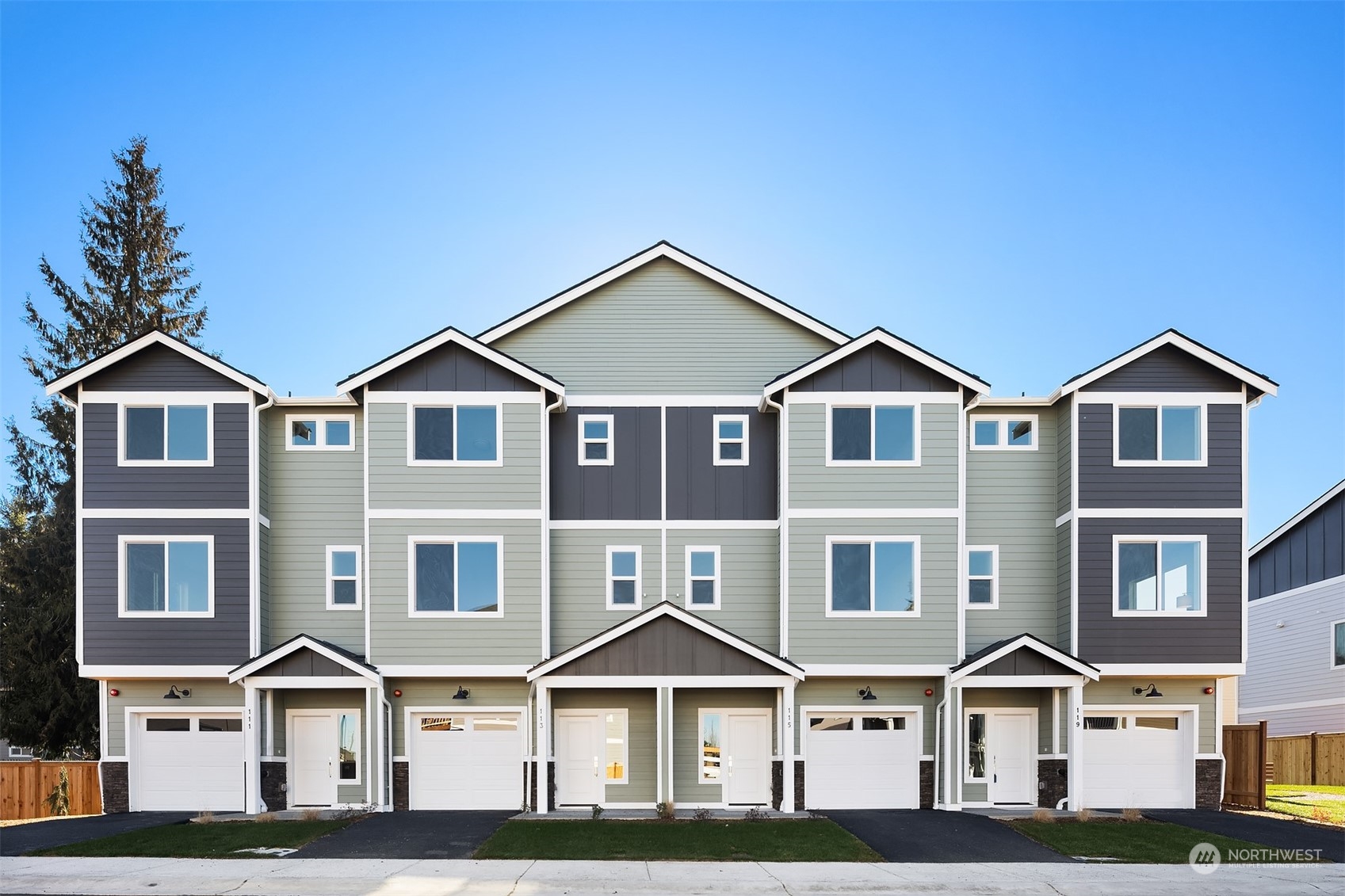 a front view of residential houses