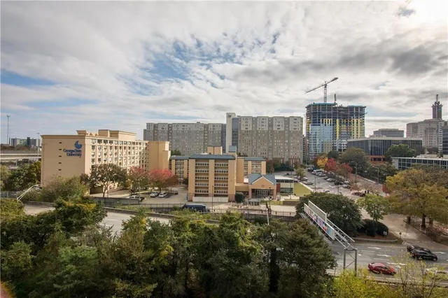 a view of a city with tall buildings