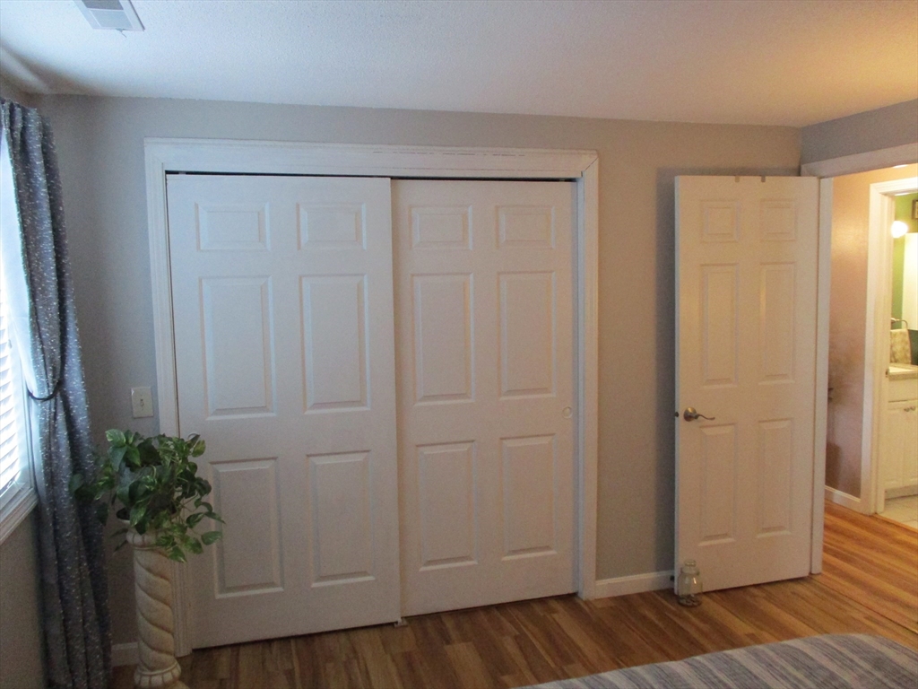 1475 Braley Road, Unit 21 New Bedford, MA 02745 - Photo 17 of 20 a view of entryway with wooden floor