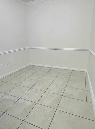 a bathroom with a sink a toilet and shower curtain