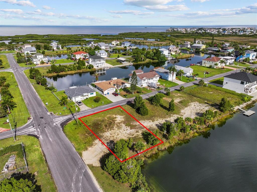3366 Crape Myrtle Drive Hernando Beach, FL 34607 - Photo 4 of 10 an aerial view of residential houses with outdoor space