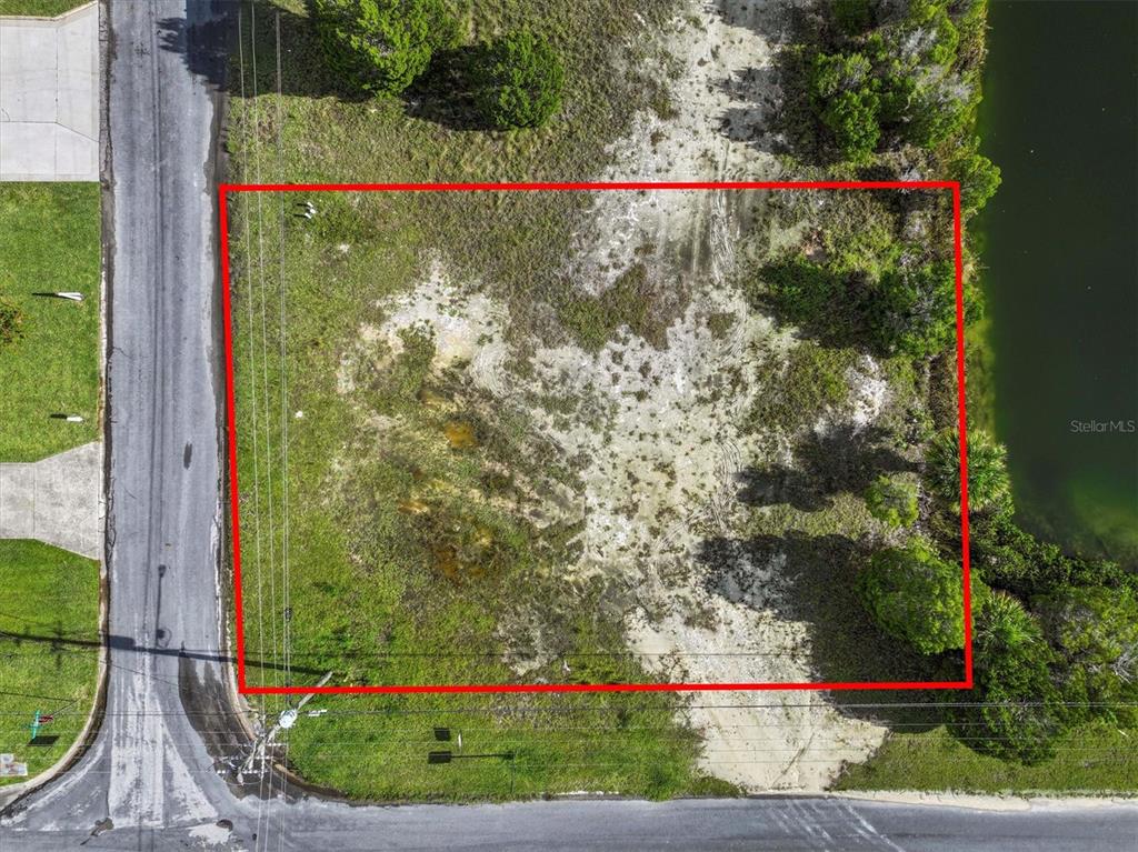 3366 Crape Myrtle Drive Hernando Beach, FL 34607 - Photo 9 of 10 a view of a sign in front of a house