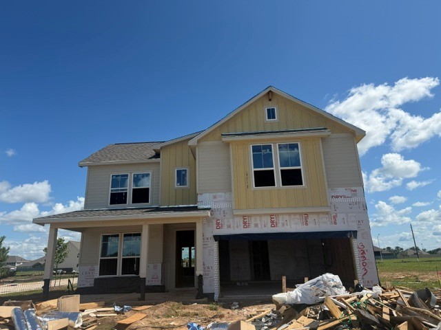 32503 Vly Redstem Way Fulshear, TX 77441 - Photo 2 of 18 a front view of a house with a yard