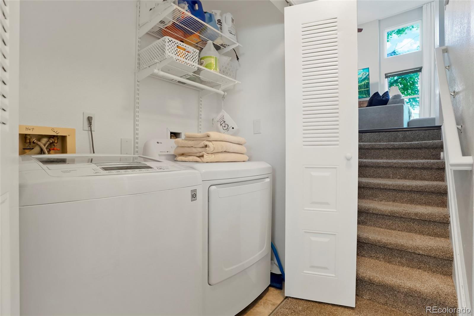 9191 Hickory Circle Highlands Ranch, CO 80126 - Photo 22 of 27 a bathroom with a sink and a mirror