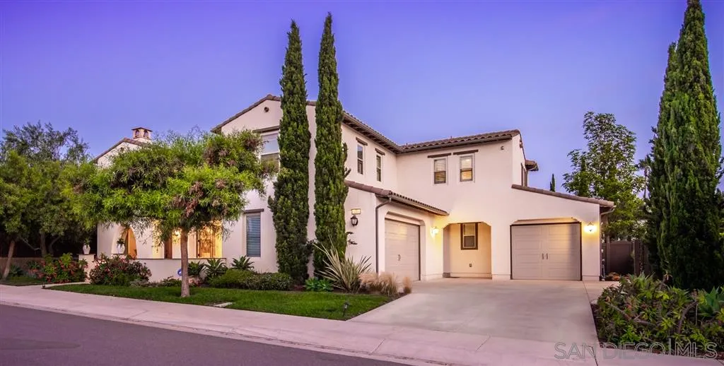 757 Blossom Road Encinitas, CA 92024 - Photo 1 of 25 a front view of a house with a yard and garage