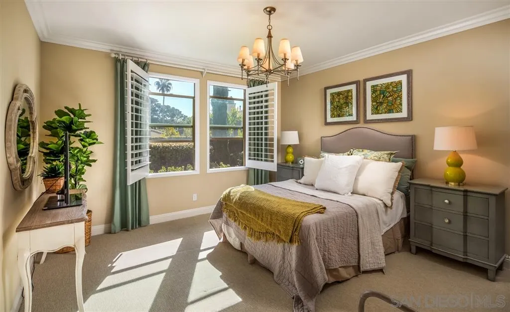 757 Blossom Road Encinitas, CA 92024 - Photo 16 of 25 a bedroom with a large bed and a window