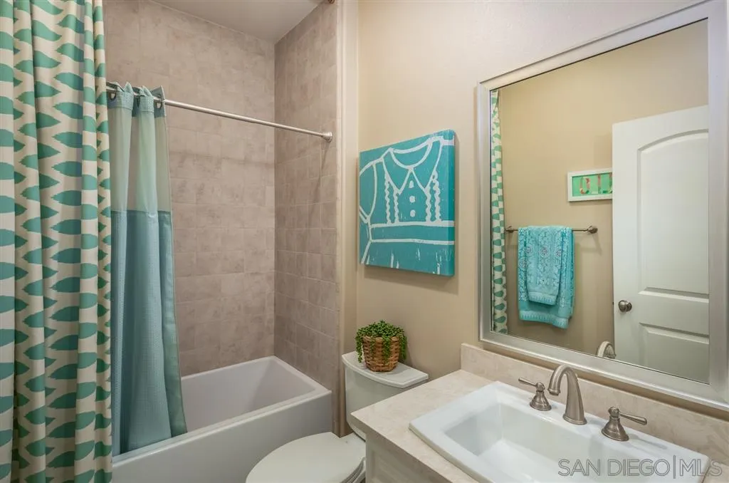 757 Blossom Road Encinitas, CA 92024 - Photo 17 of 25 a bathroom with a sink toilet and shower