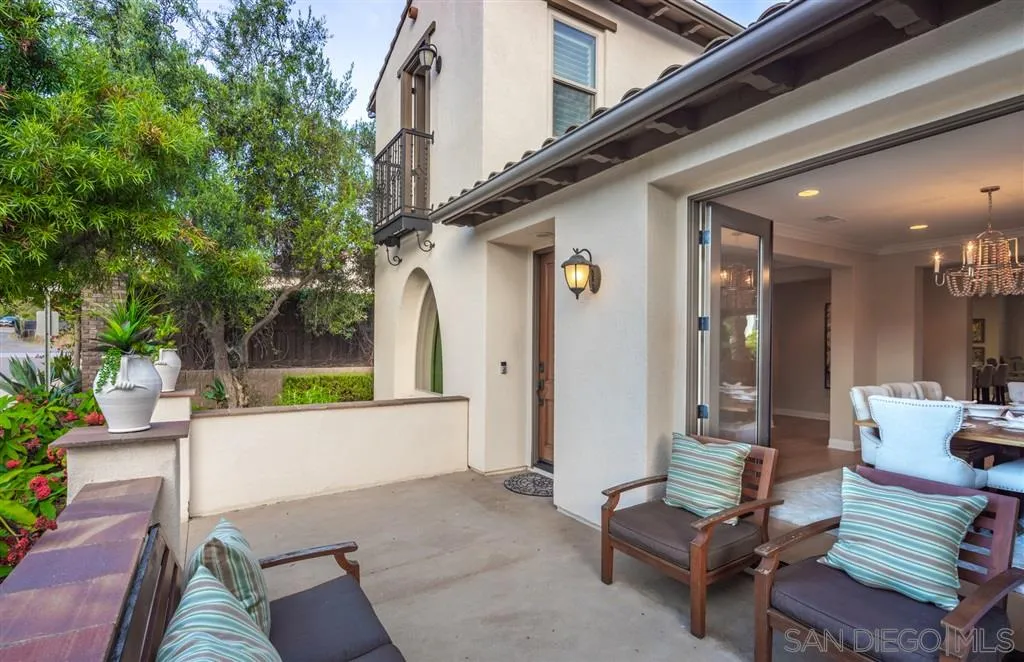 757 Blossom Road Encinitas, CA 92024 - Photo 20 of 25 a view of an chairs and tables in the patio