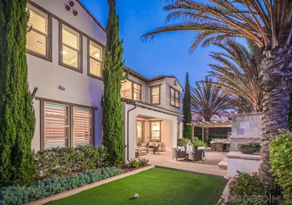757 Blossom Road Encinitas, CA 92024 - Photo 24 of 25 a view of a brick building with a bench and a yard