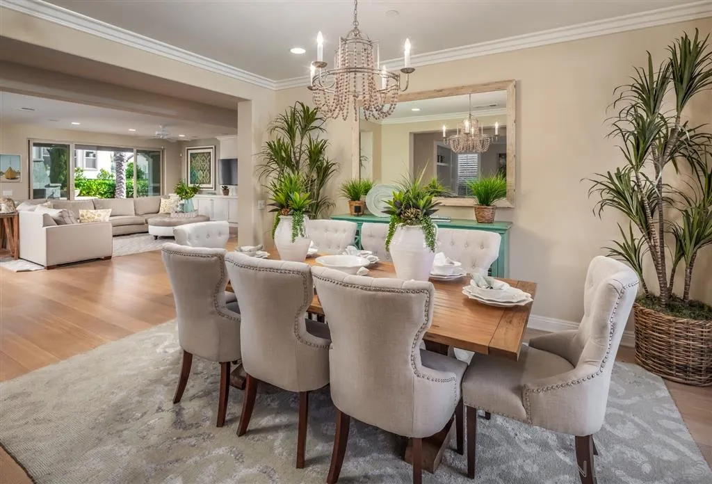 757 Blossom Road Encinitas, CA 92024 - Photo 6 of 25 a view of a dining room with furniture and chandelier