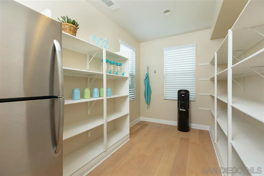 757 Blossom Road Encinitas, CA 92024 - Photo 10 of 25 a view of an empty room with empty racks