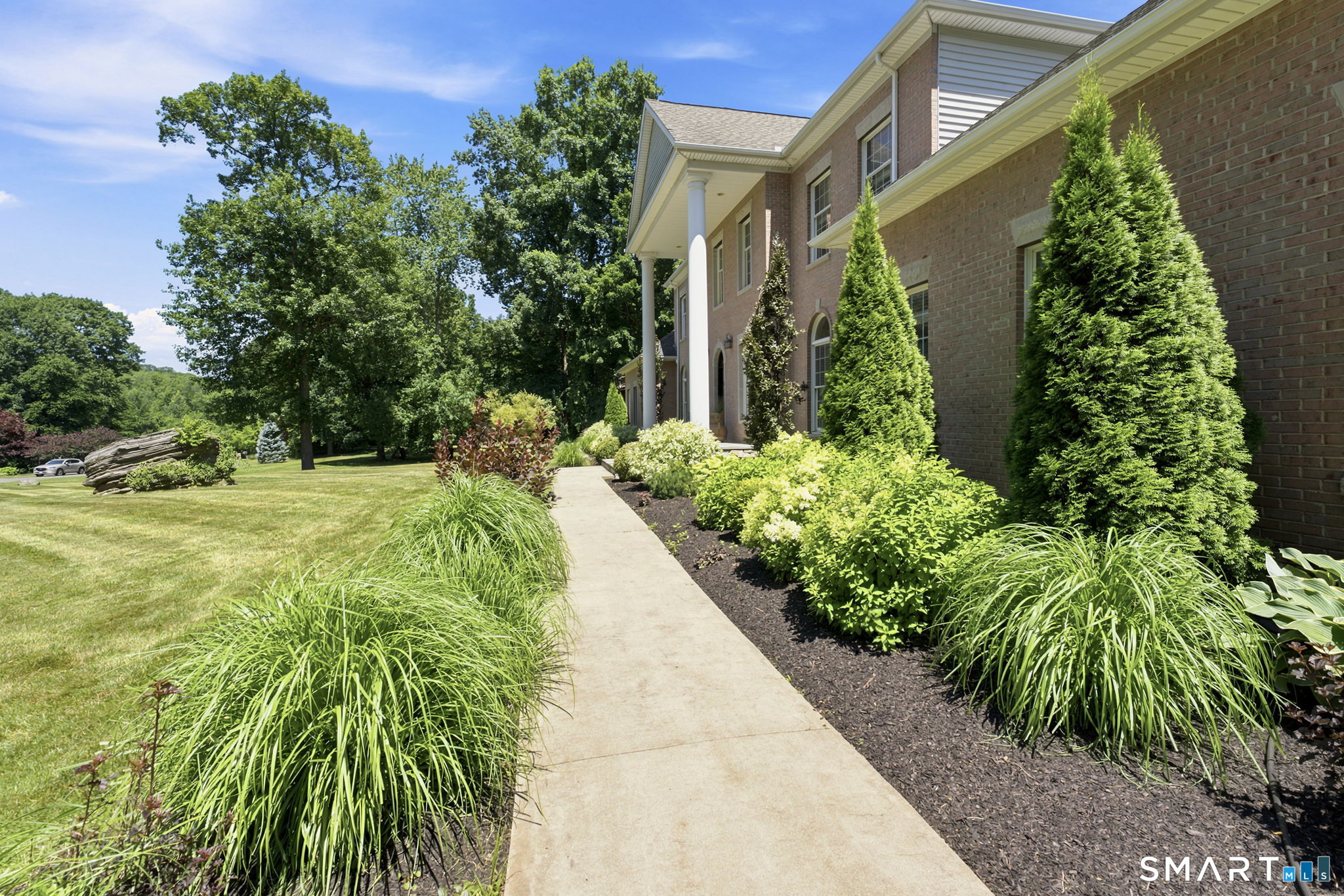 52 Country Club Road Bolton, CT 06043 - Photo 34 of 36 a view of a garden with plants