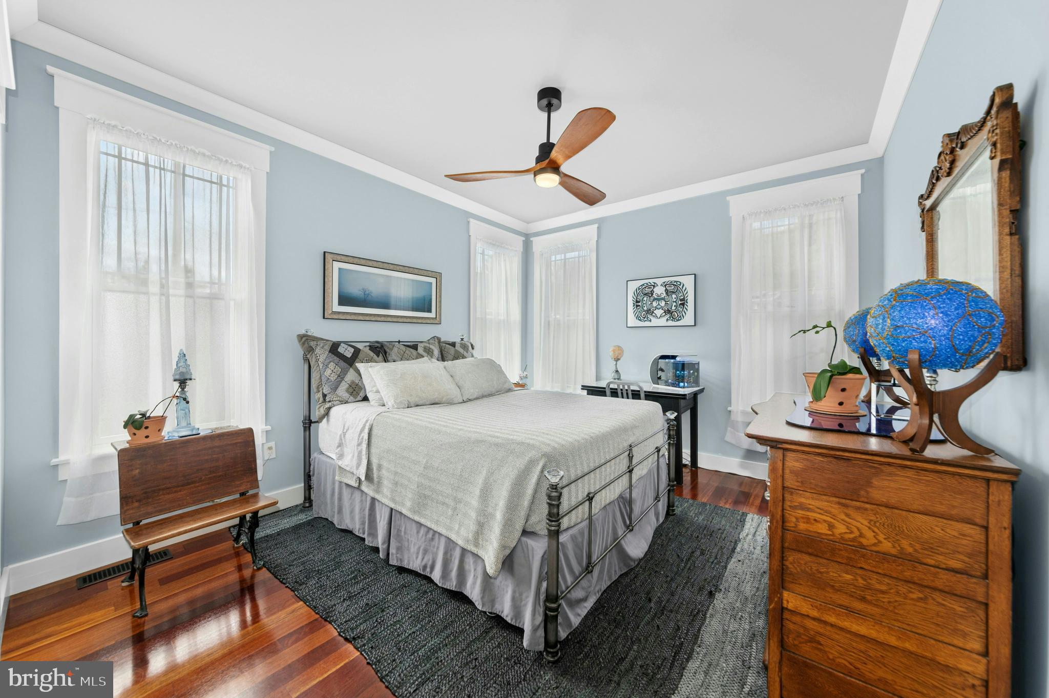 1235 River Road Upper Black Eddy, PA 18972 - Photo 19 of 41 a bed room with a bed and a chandelier