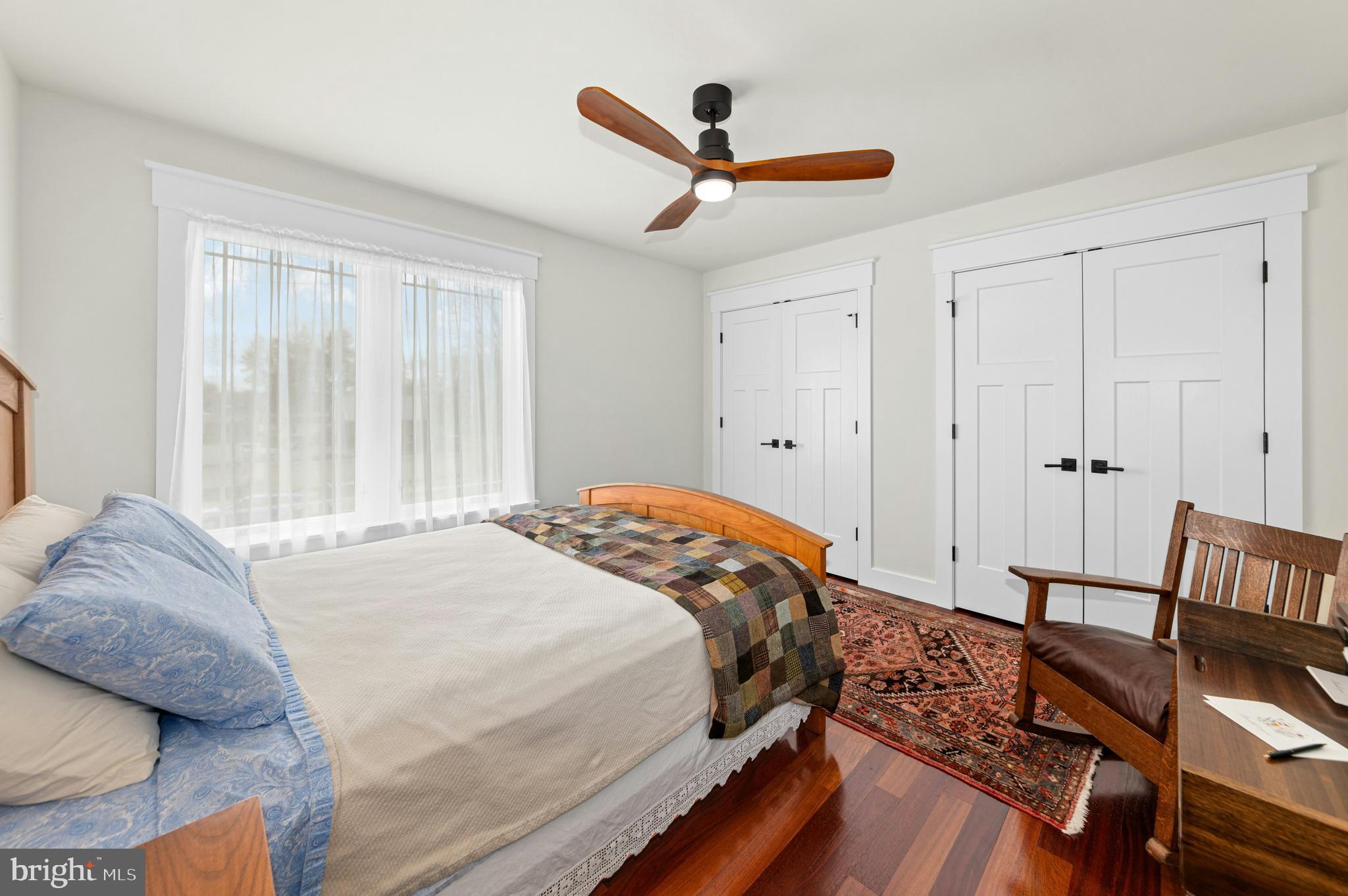 1235 River Road Upper Black Eddy, PA 18972 - Photo 29 of 41 a bedroom with bed and wooden floor