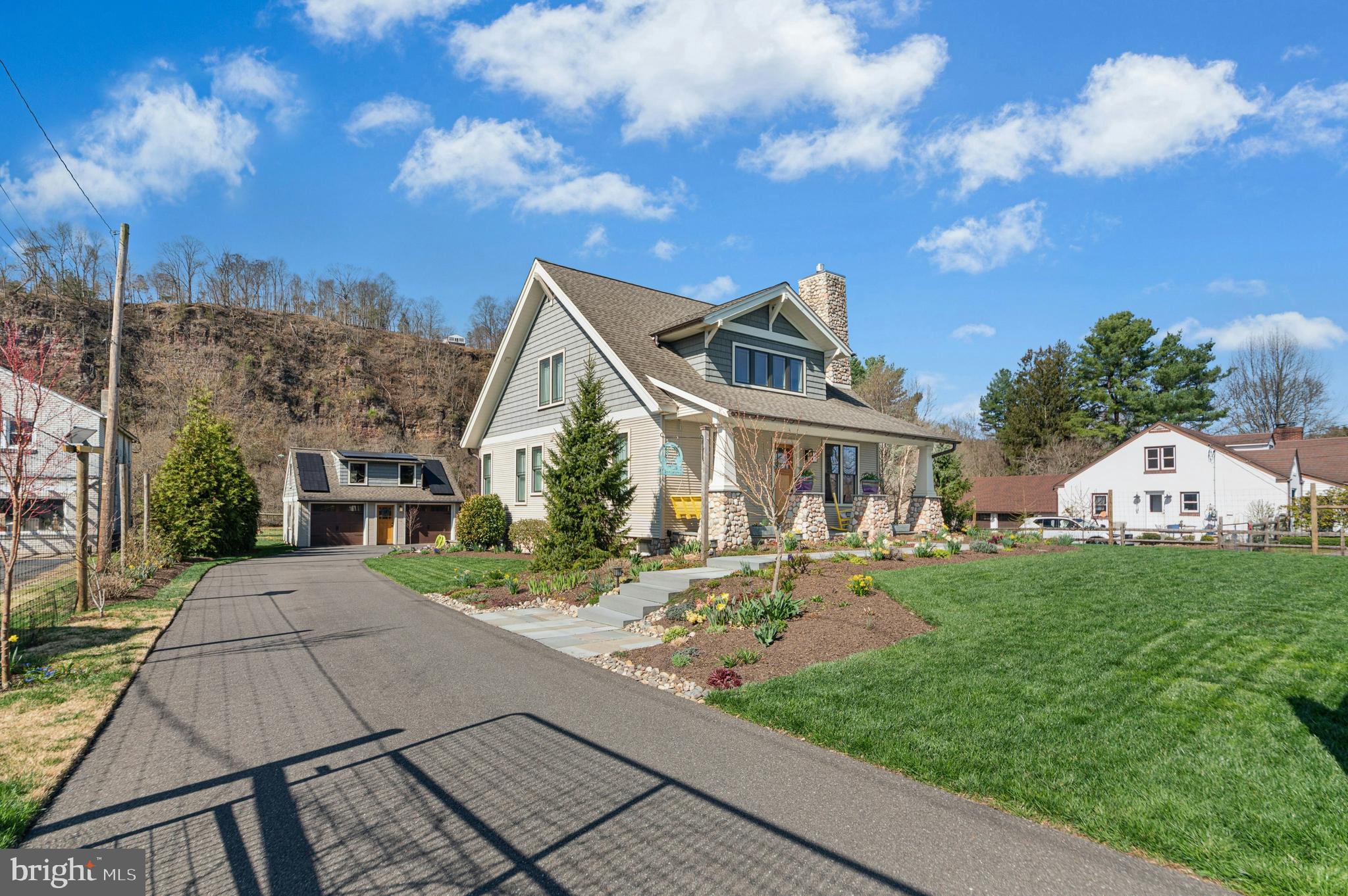 1235 River Road Upper Black Eddy, PA 18972 - Photo 3 of 41 a front view of a house with a yard