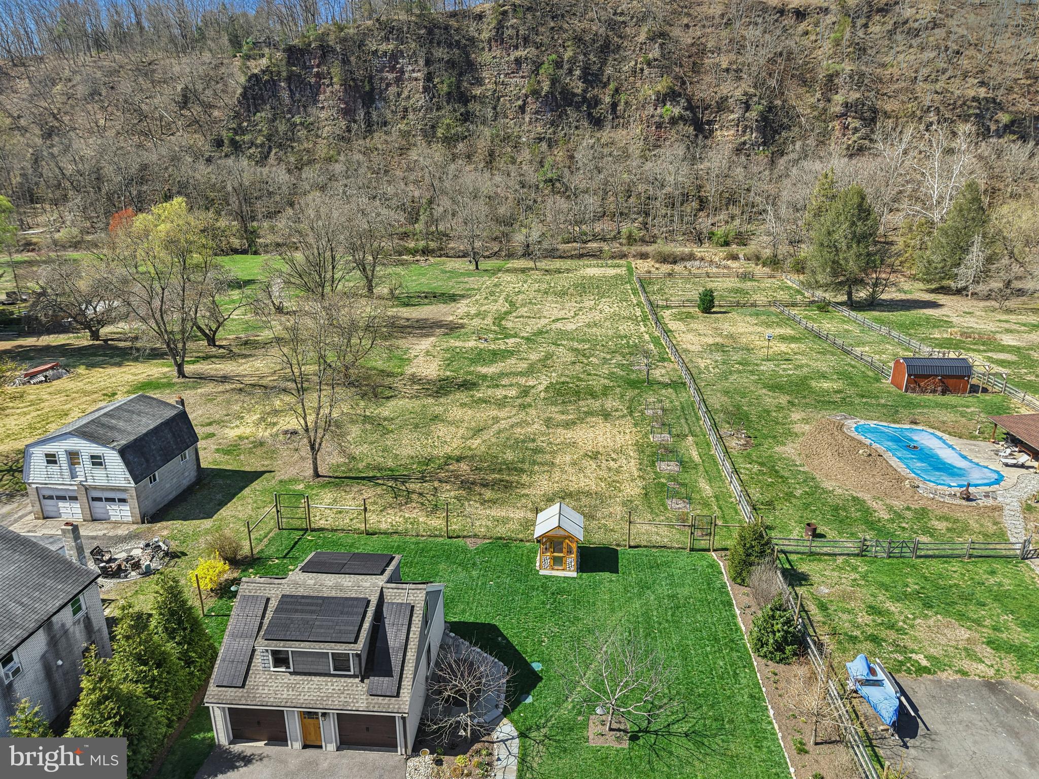 1235 River Road Upper Black Eddy, PA 18972 - Photo 6 of 41 a aerial view of a house with a yard basket ball court and outdoor seating