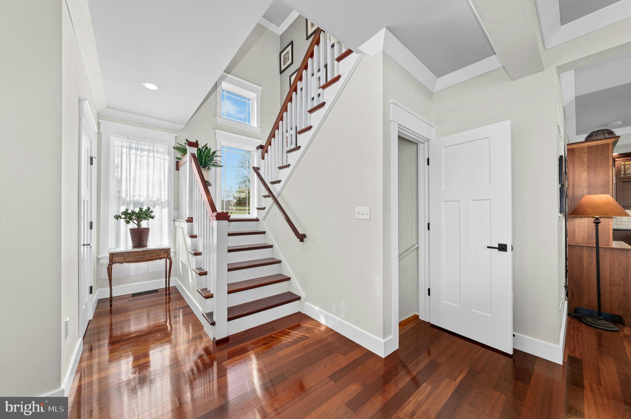 1235 River Road Upper Black Eddy, PA 18972 - Photo 8 of 41 a view of entryway with stairs and wooden floor
