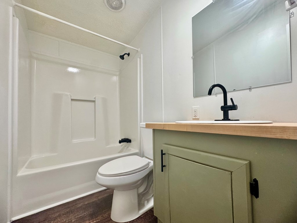 459 Vandora Suits Road Murphy, NC 28906 - Photo 28 of 40 a bathroom with a sink a toilet and shower