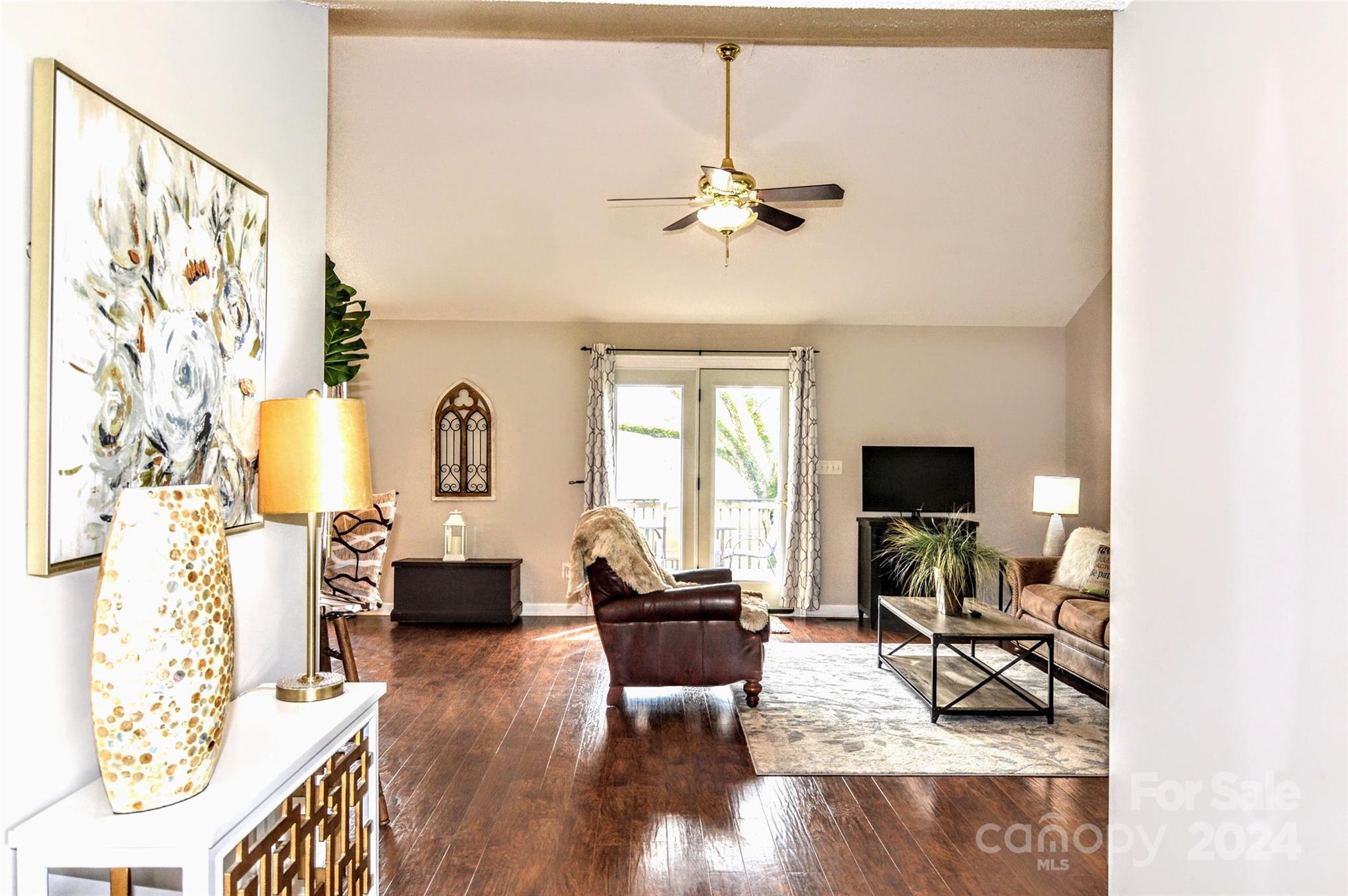 5713 Griffith Road Monroe, NC 28112 - Photo 5 of 48 a living room with furniture and a flat screen tv