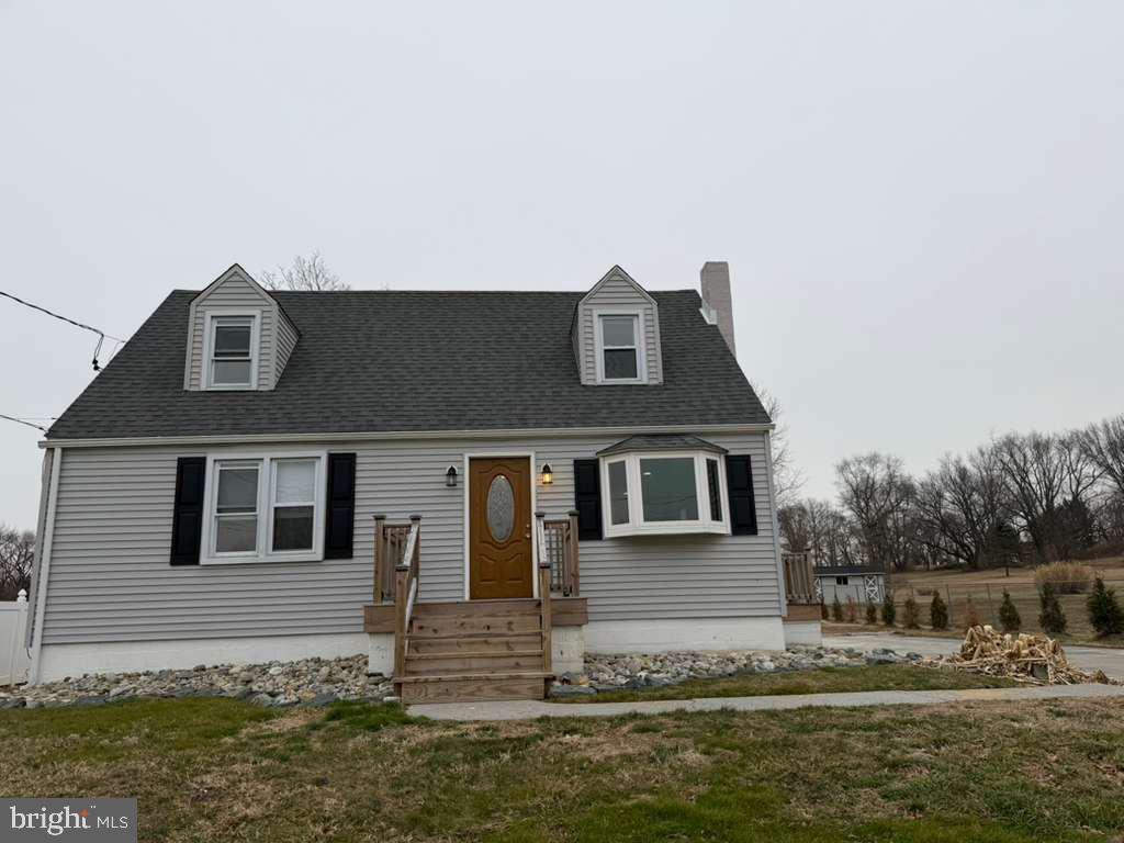 170 Airport Road New Castle, DE 19720 - Photo 2 of 3 a front view of a house with a yard